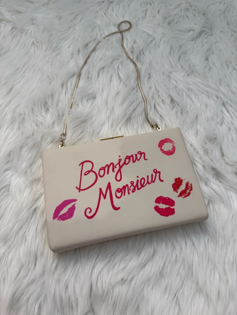 Kate spade Bonjour Monsieur Cream Crossbody Clutch with Pink Lip Print